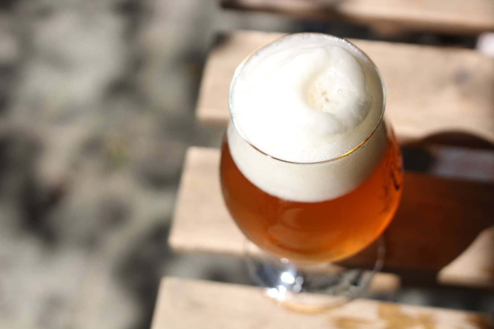 clear drinking glass with brown liquid, IPA